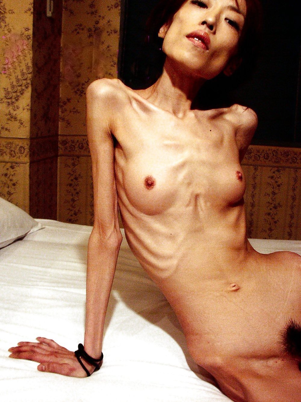 Chinese woman with a beautiful naked figure