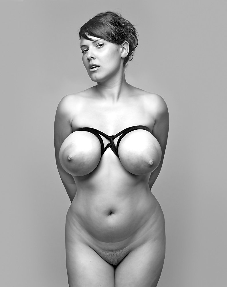 Portrait of a girl with nude breasts