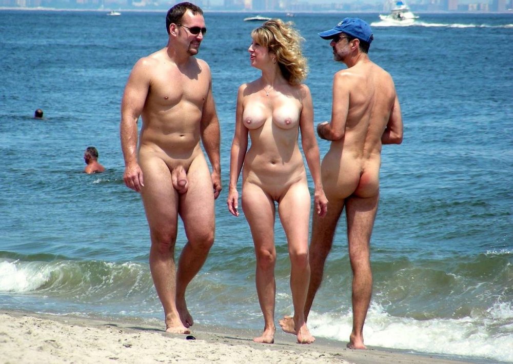 Naked sexy couple on the beach