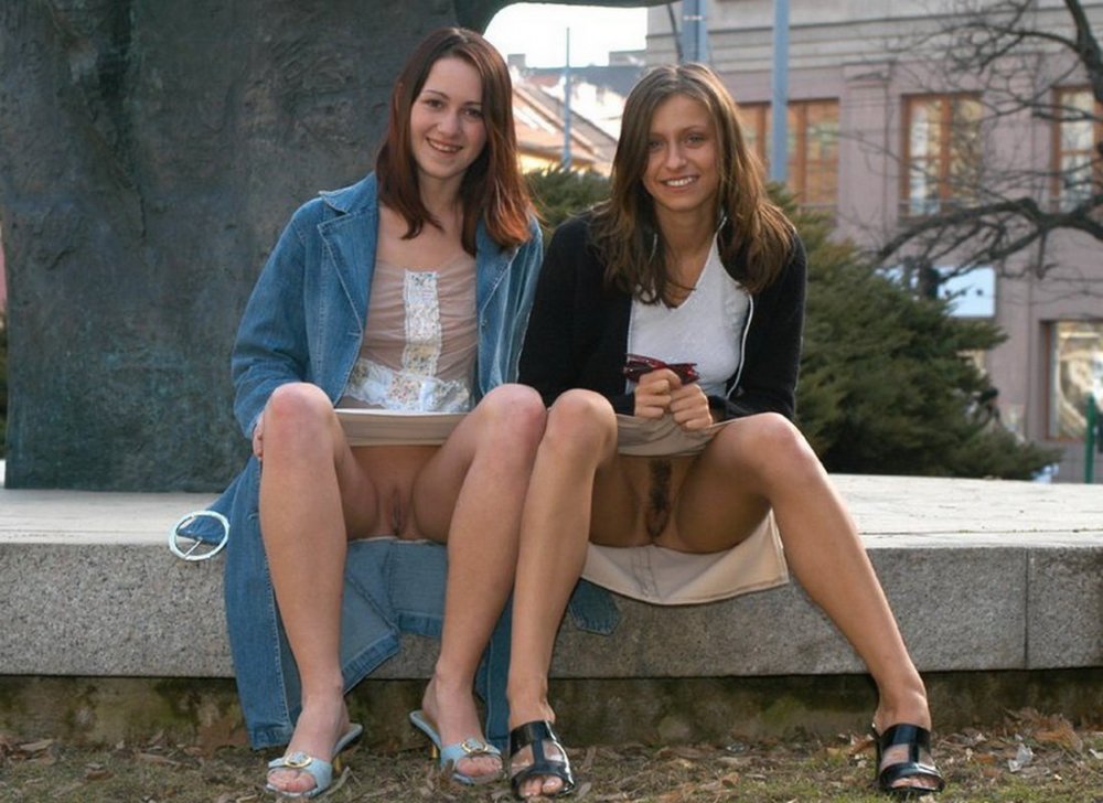 Girls sit in skirts without panties