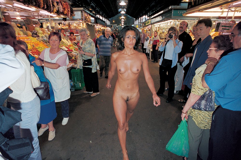 Girl undresses in public