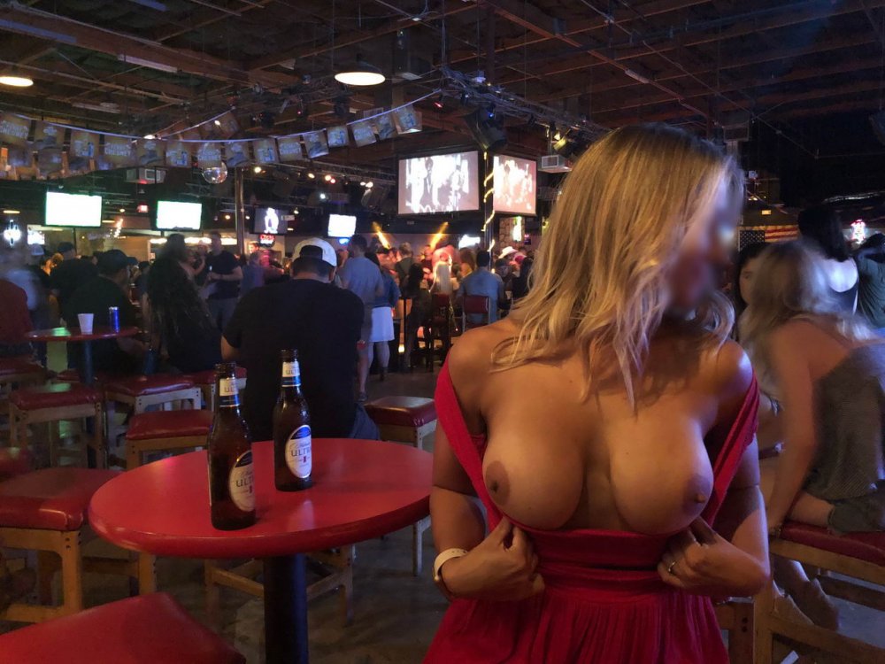 The girl showed the breast on the parade