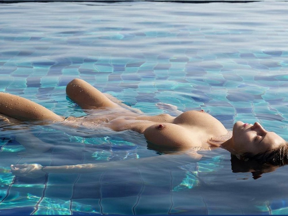 Naked swimming in the pool