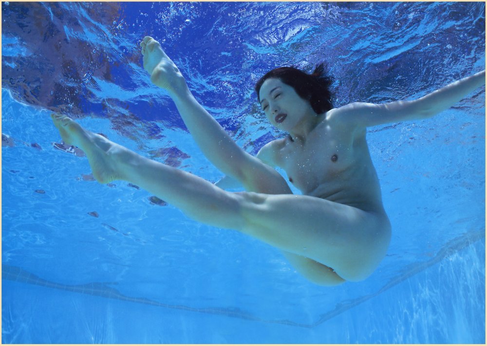 Naked women jumping into the swimming pool