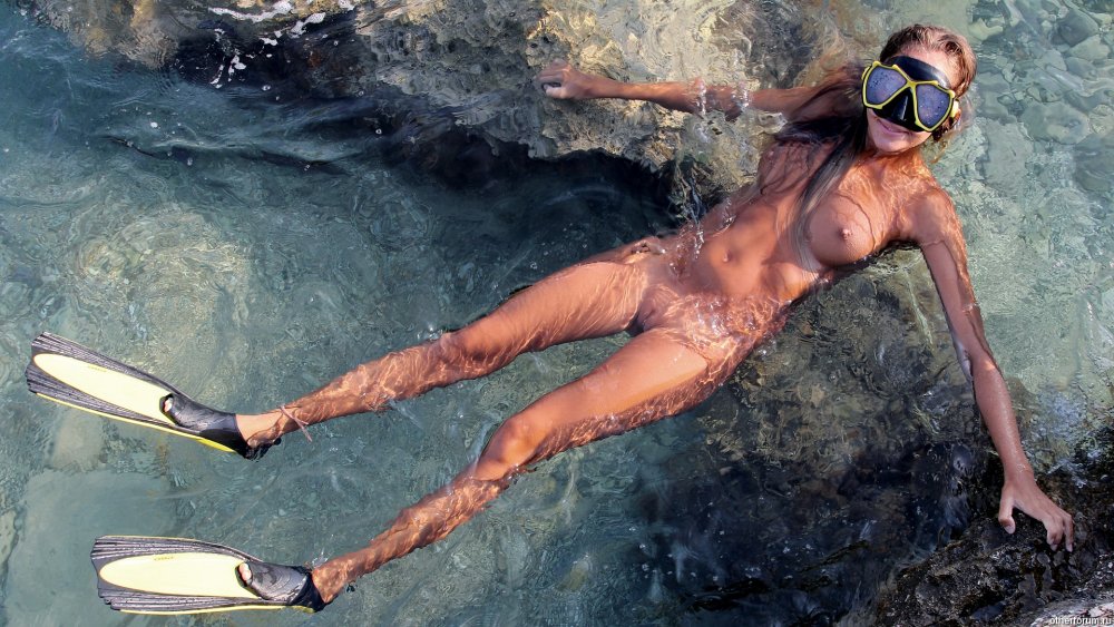 Naked woman diver