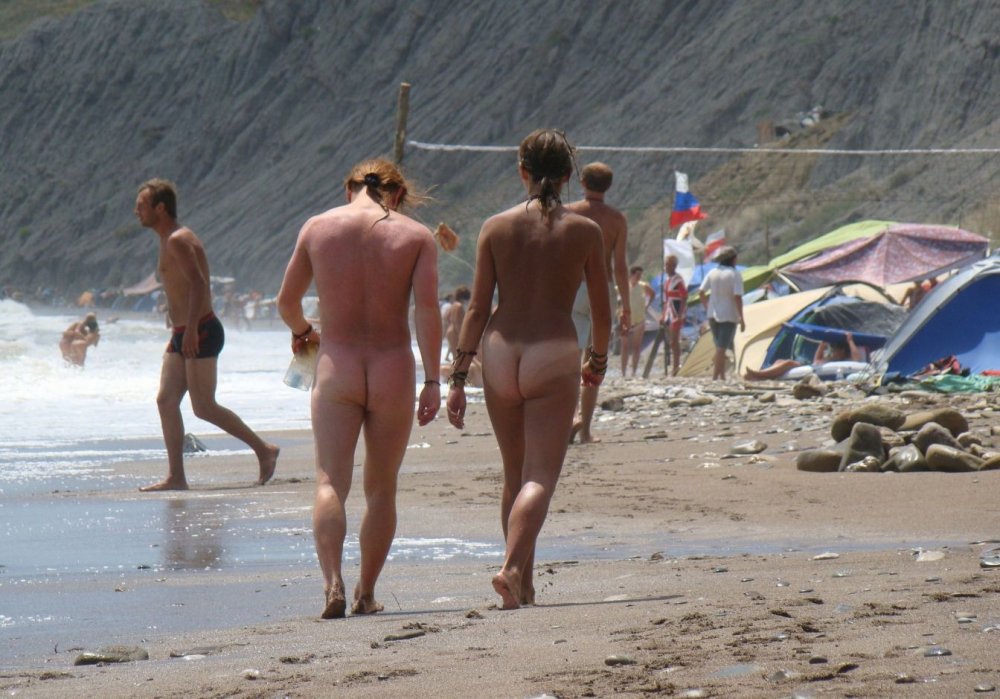 Boys on a nudian beach