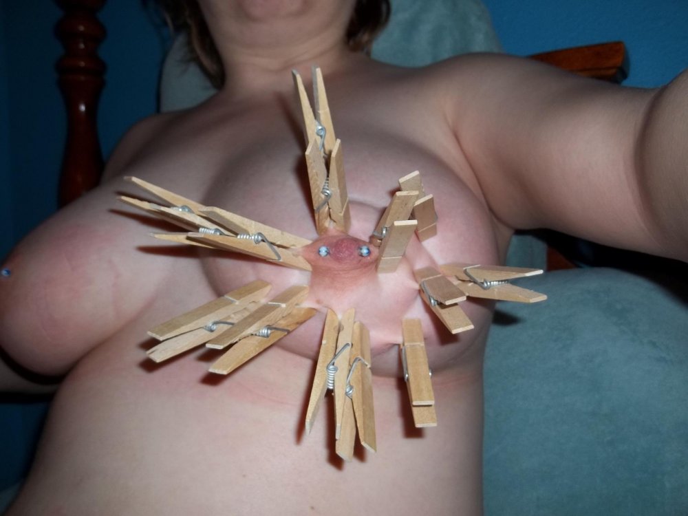 BDSM pulling off the nipples