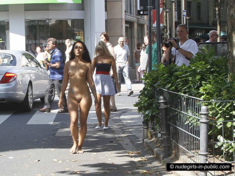 Naked women in crowded places