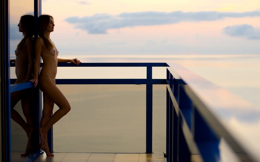 Naked chicks on the balcony