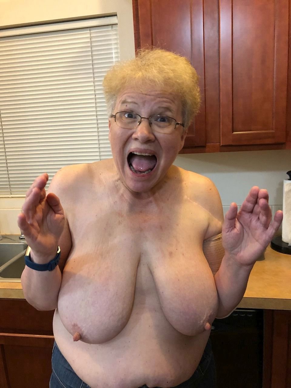 Elderly woman with large breasts