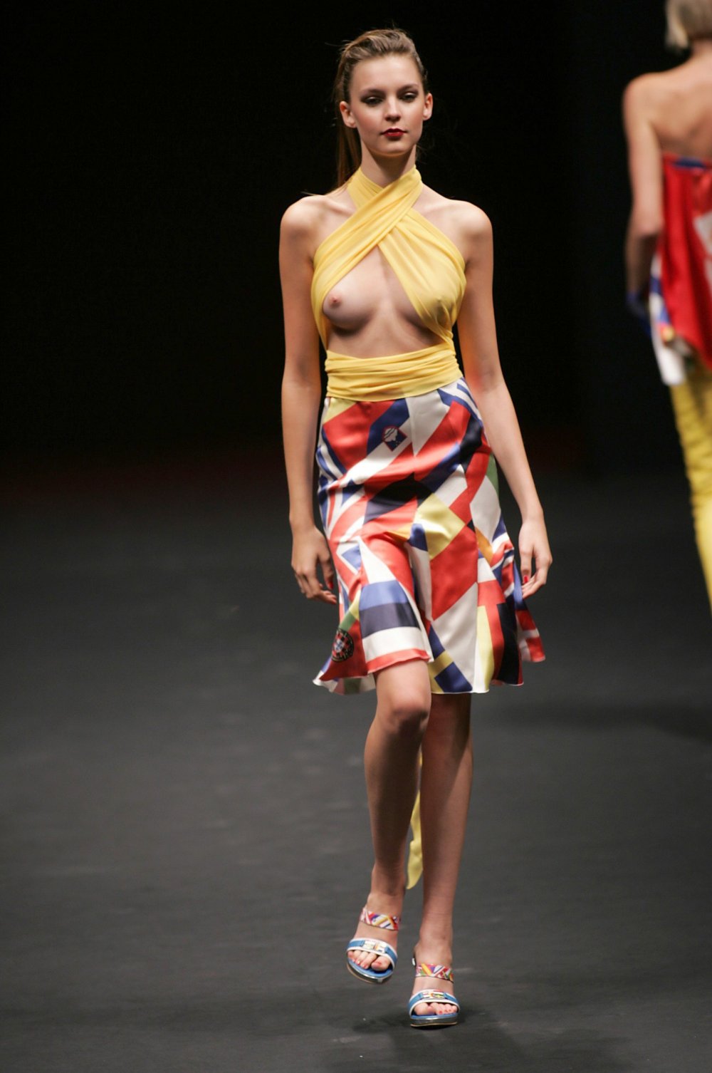 Naked fashion model on the catwalk