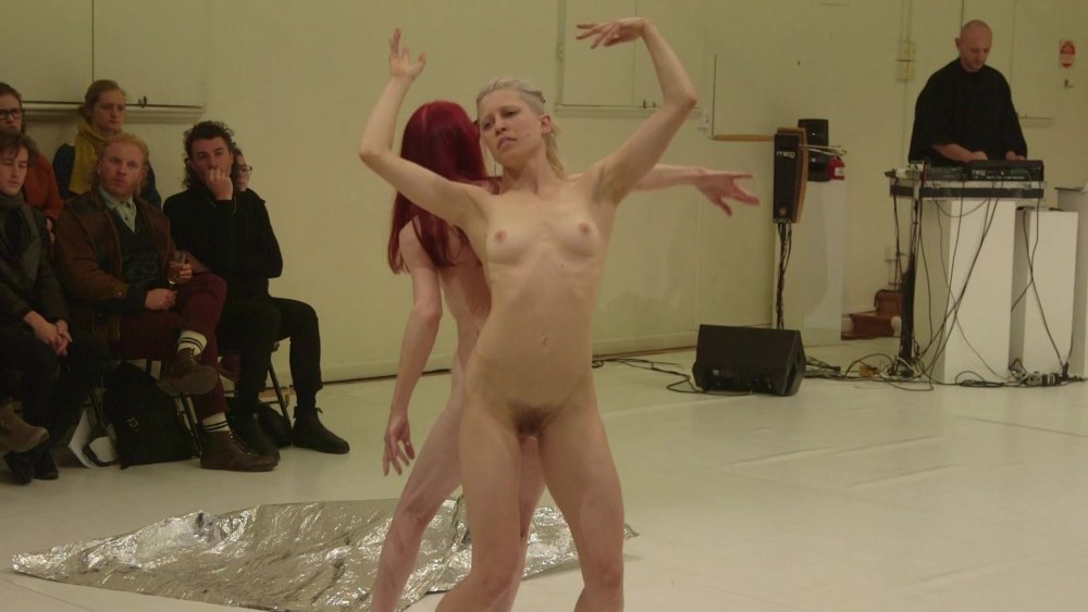 Naked woman dances striptease