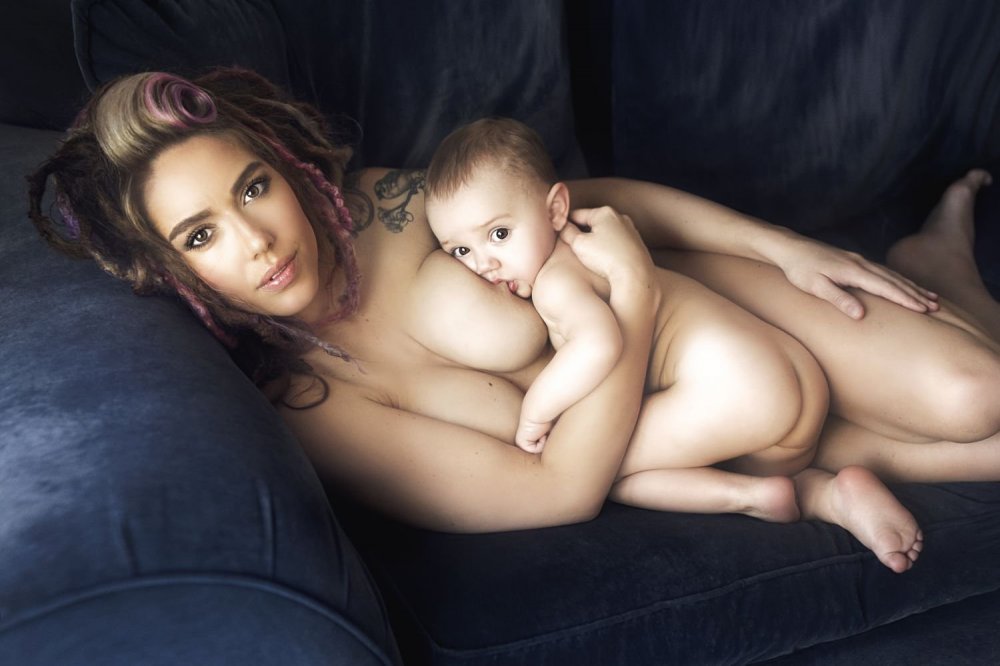 Naked woman with a baby