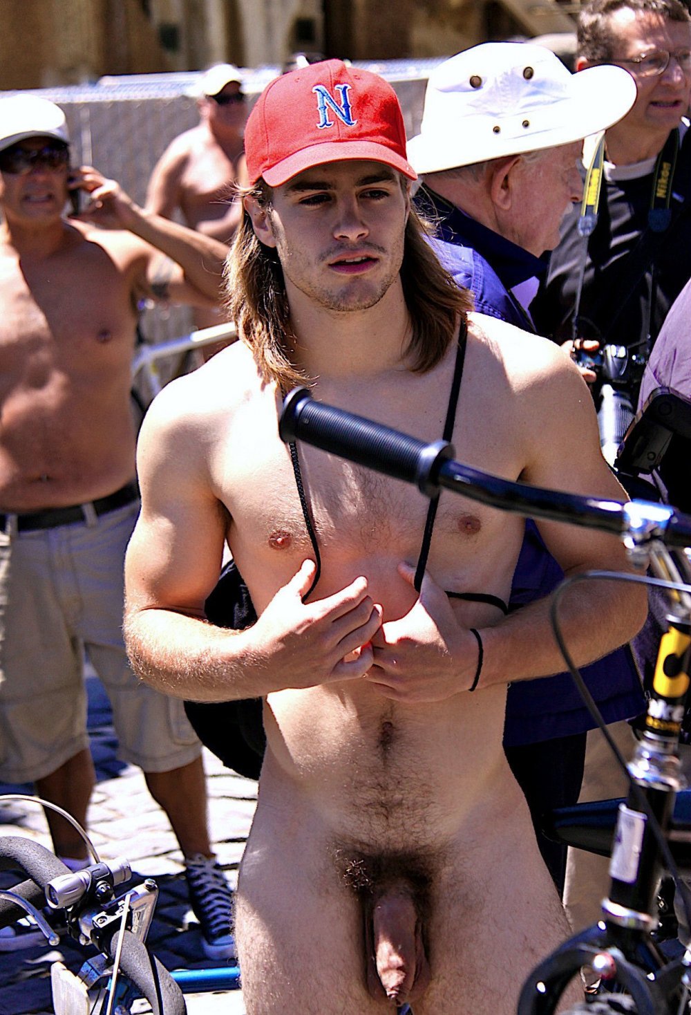 The guys undress in the locker room