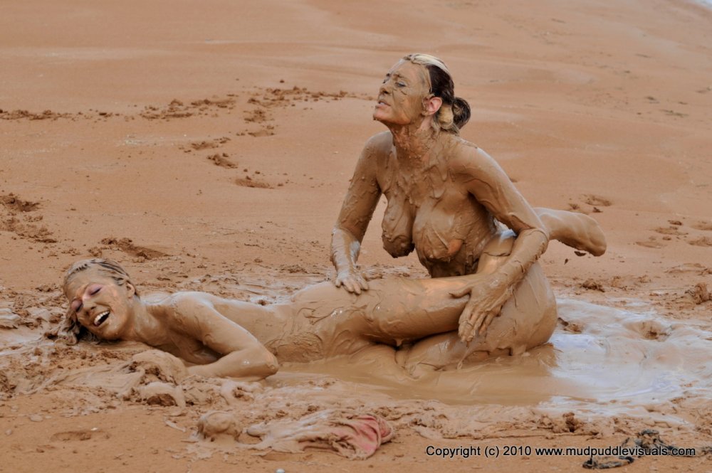 Girls post -apocalypse nude in mud