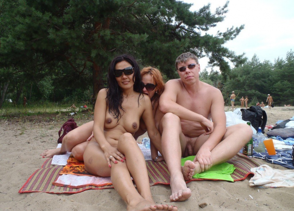 Family pairs of swingers on the beach