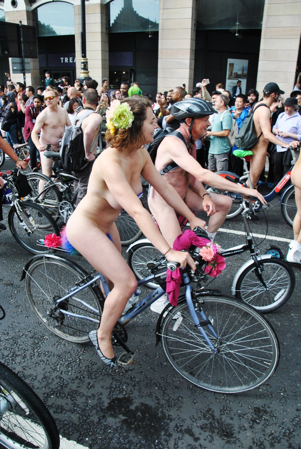 Naked cyclists on the street