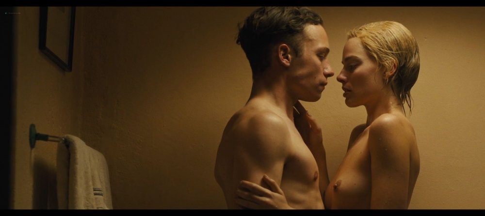 Naked beauties in bed