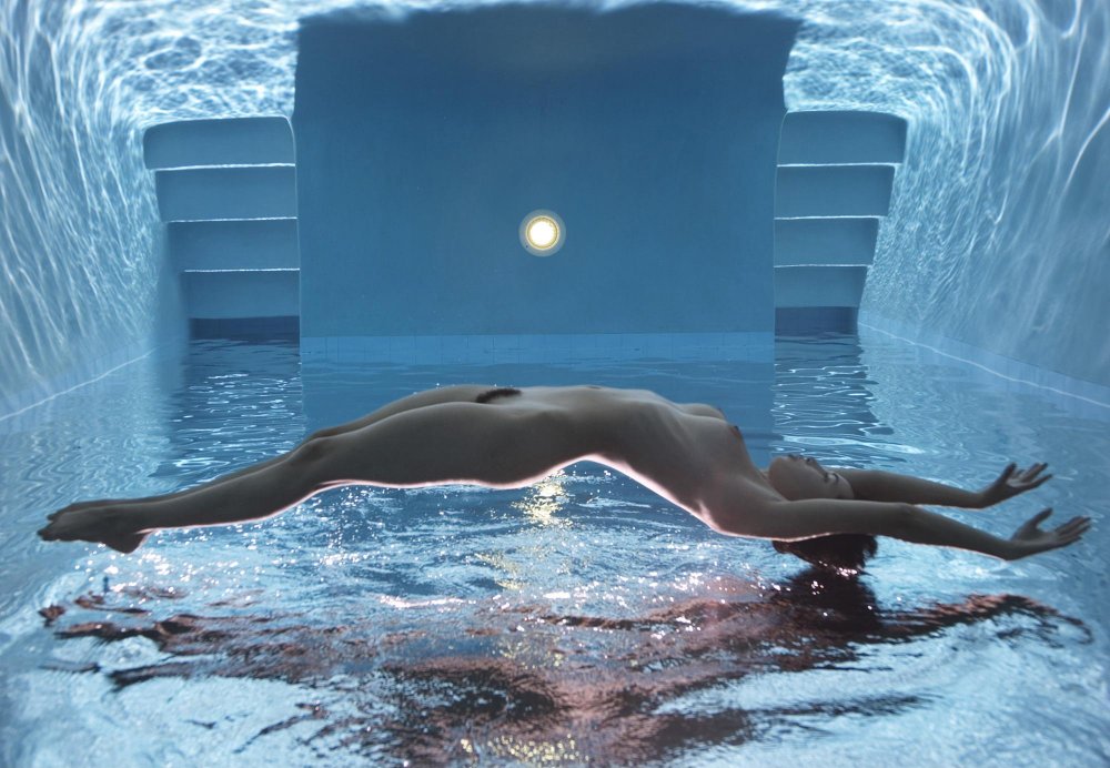 Naked girls in water