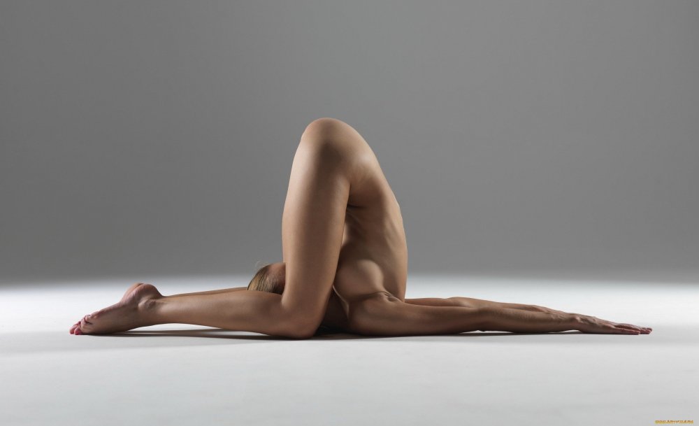 Naked woman in a lotus pose