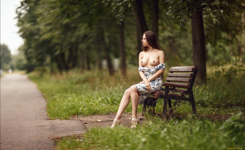 Naked in the park on a bench