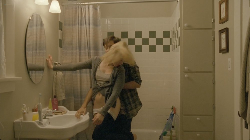 Elizabeth Banks in the bathroom