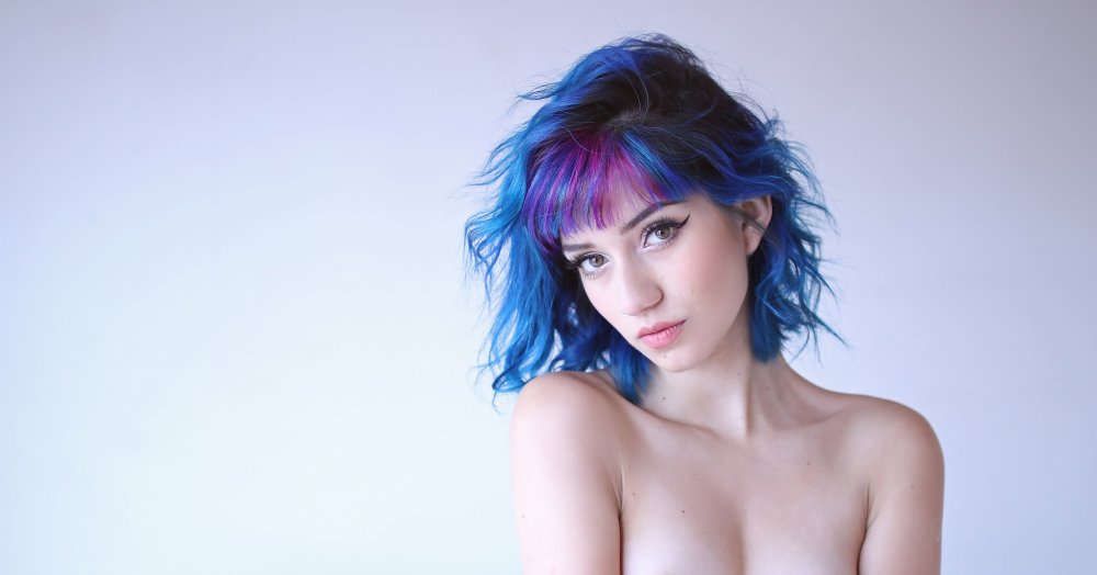 Naked woman with dyed hair