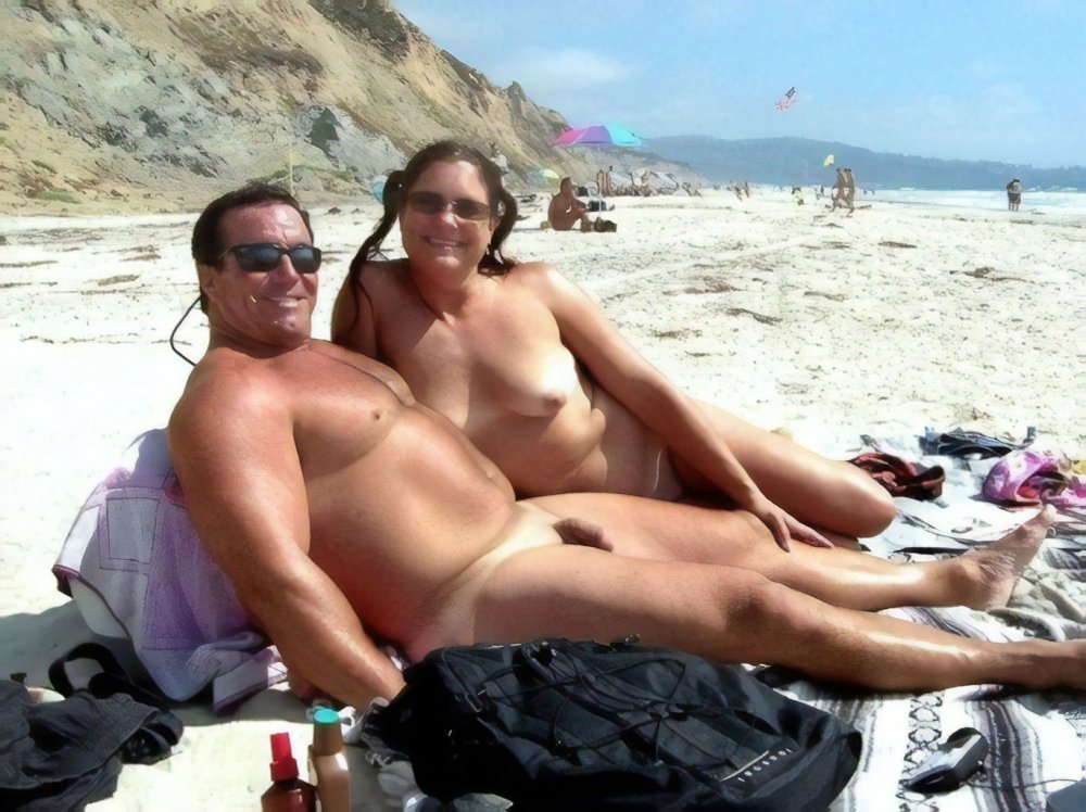 Naked couples on the beach