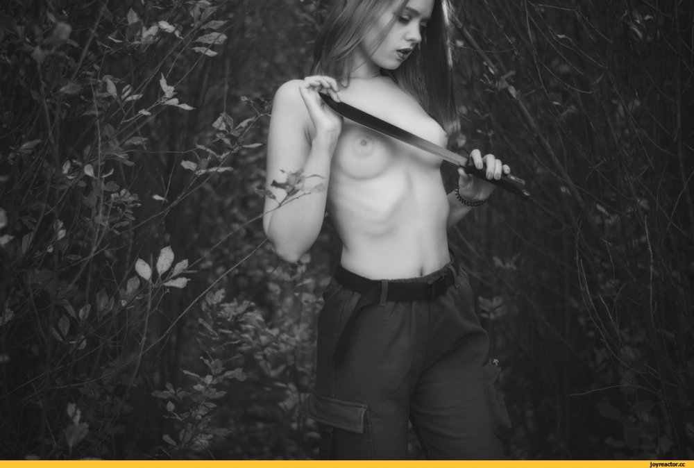 Beautiful photo shoot nude in a gloomy forest