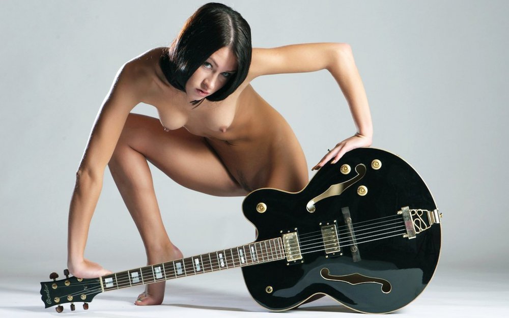 Girls with a guitar without panties