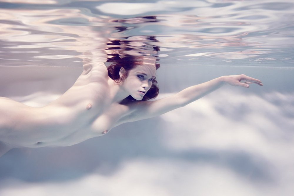 Naked girls in water