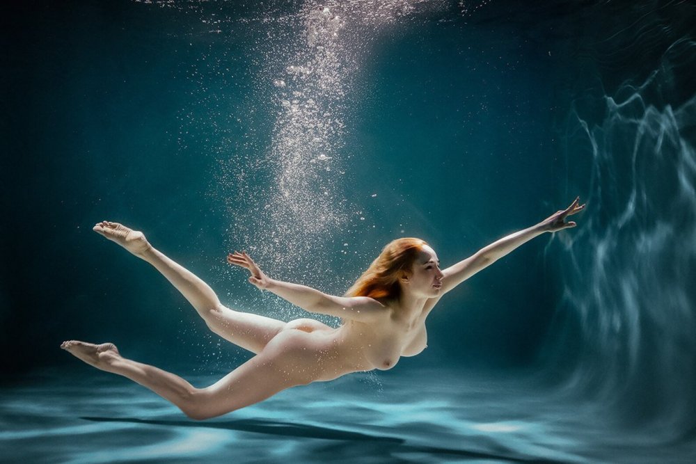 Naked girls in water