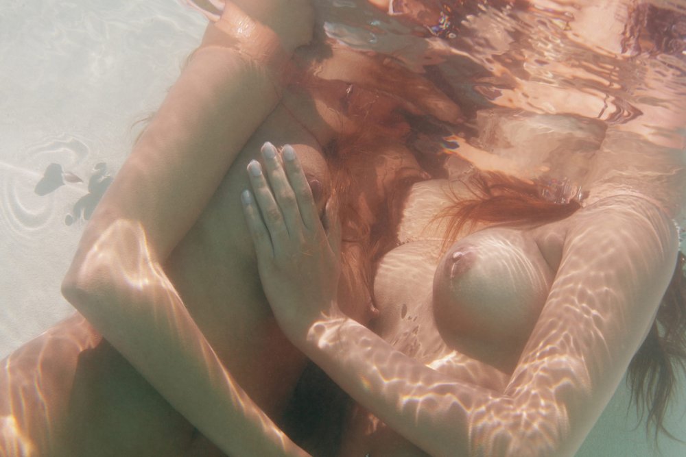 Lesbian girls underwater