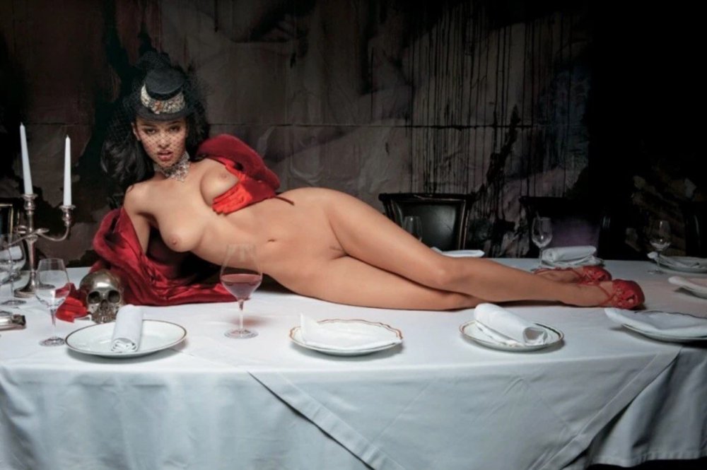 Naked beauties in a restaurant