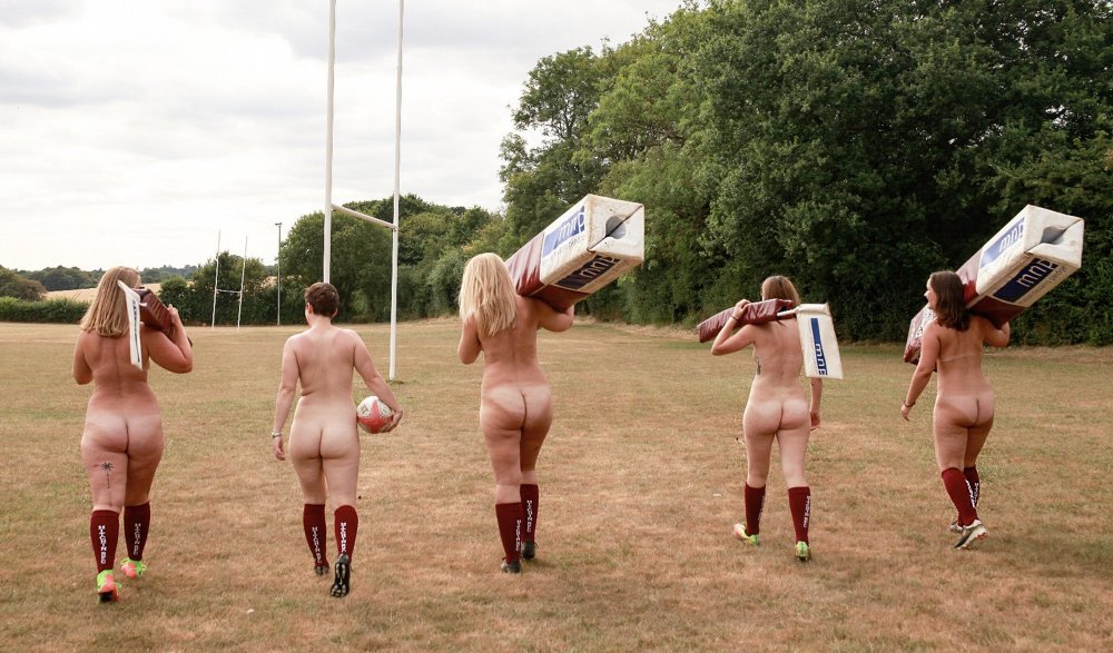 Naked women football players
