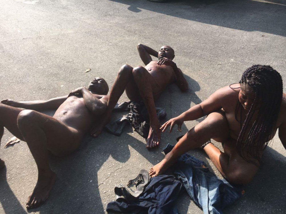 Black Woman Stripped Naked and Tied by Mob