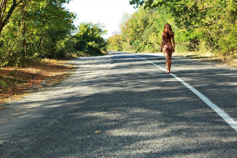 Girl votes on the road nude