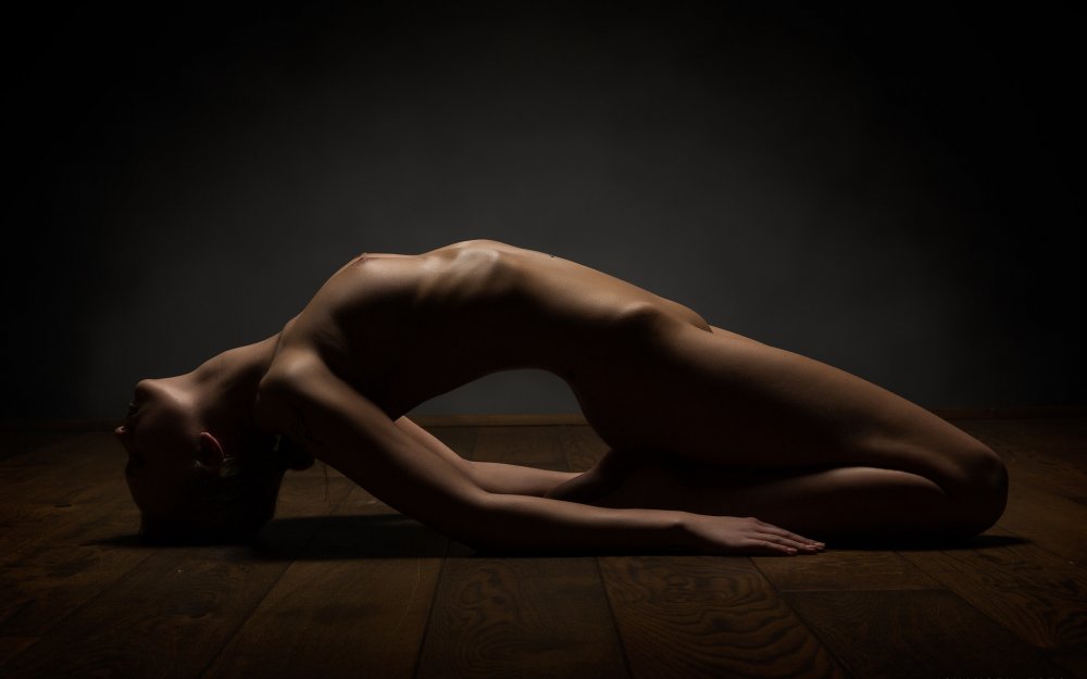 Naked women lying in the studio