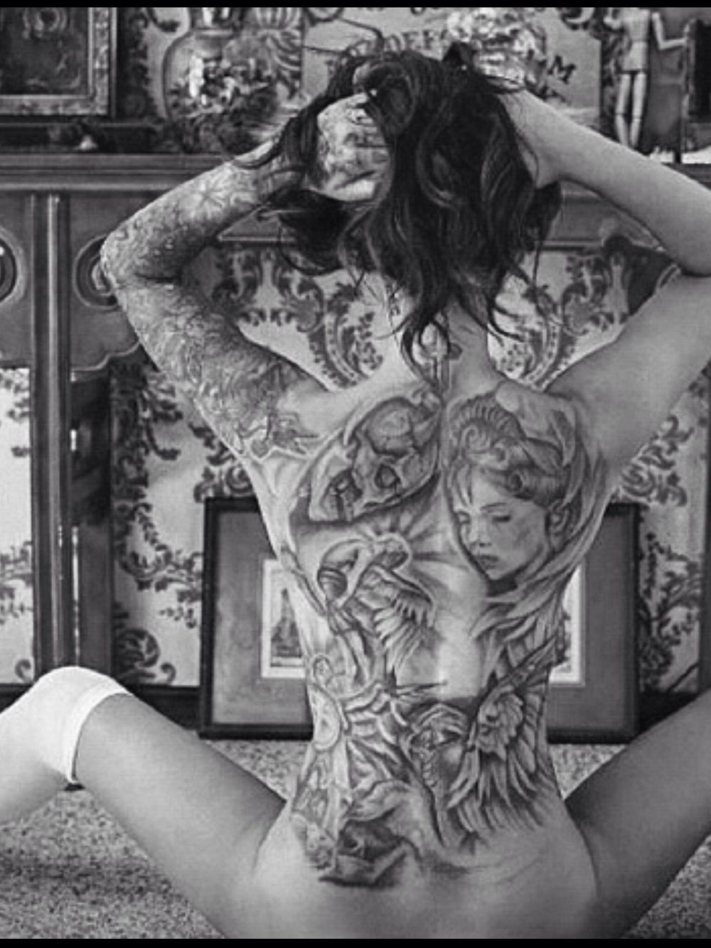 Erotic tattoo on the back