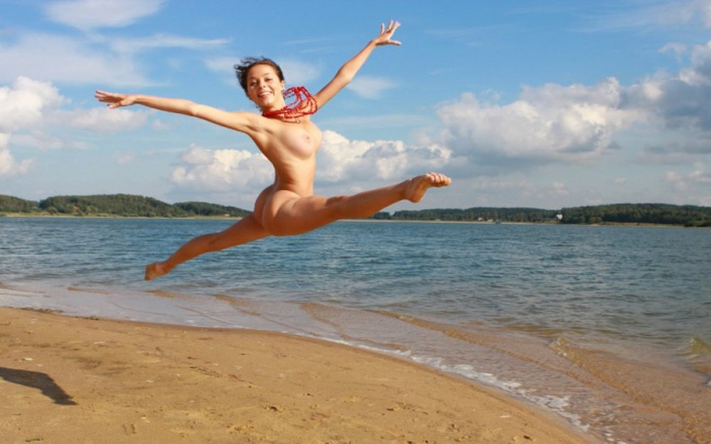 Naked girls jump into the water