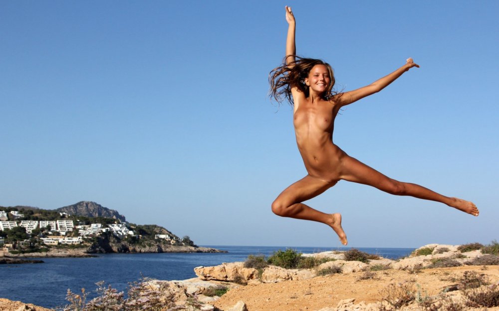 Naked athletes on the beach