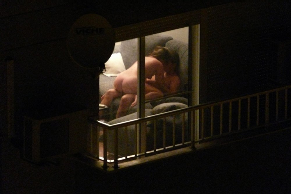 Voyeurists looking into the windows
