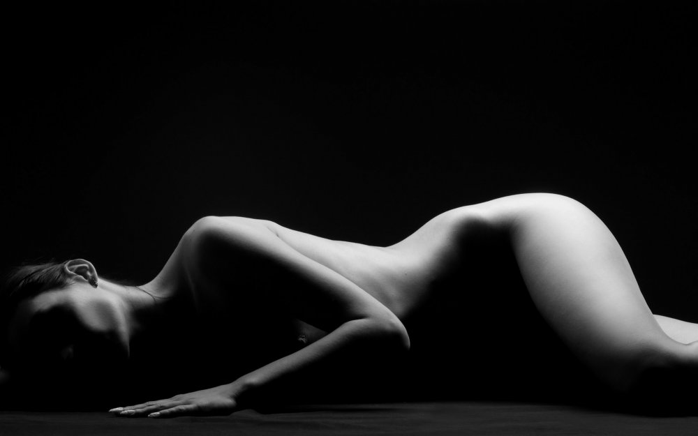 Nude on a dark background