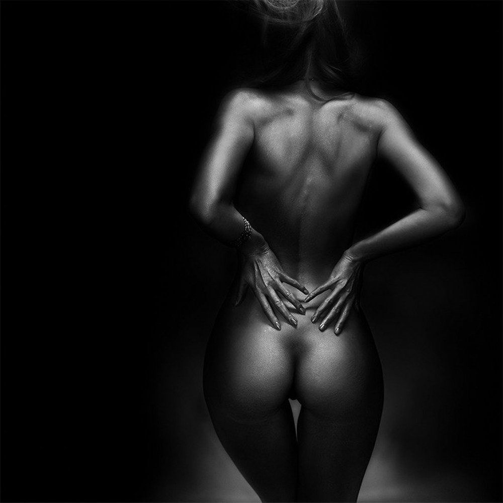 Naked women on a dark background