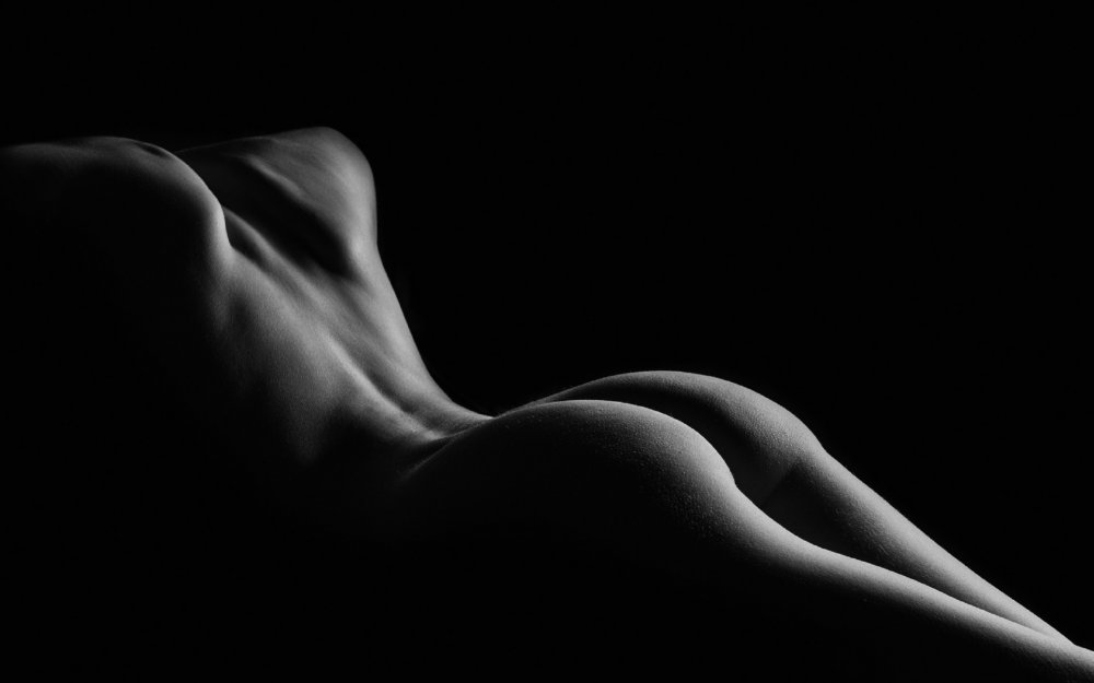 Nude on a dark background