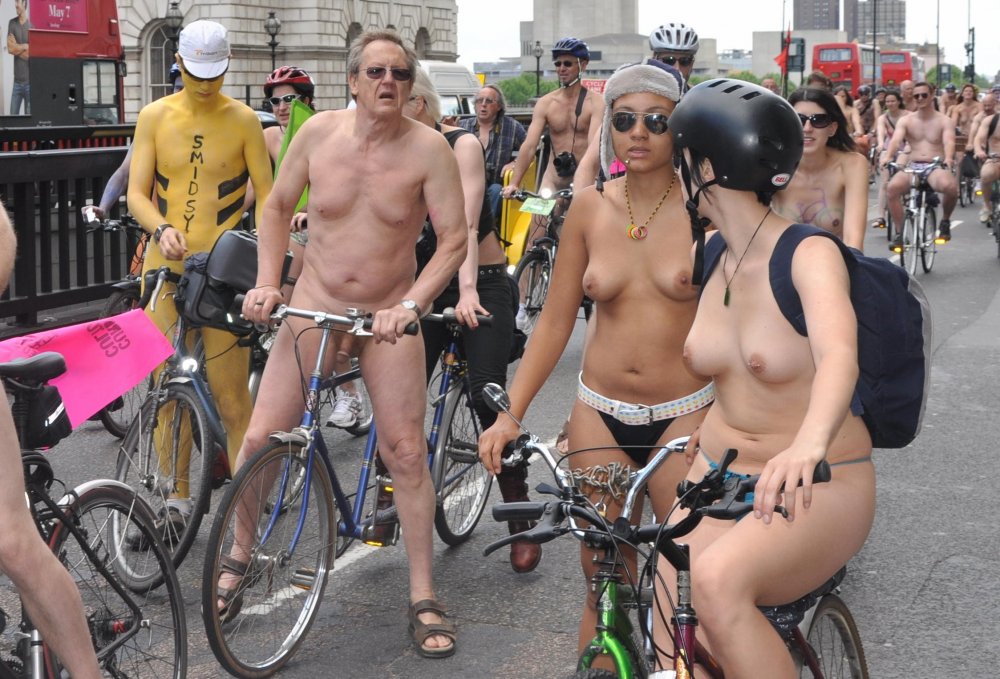 Naked women on a bike racket