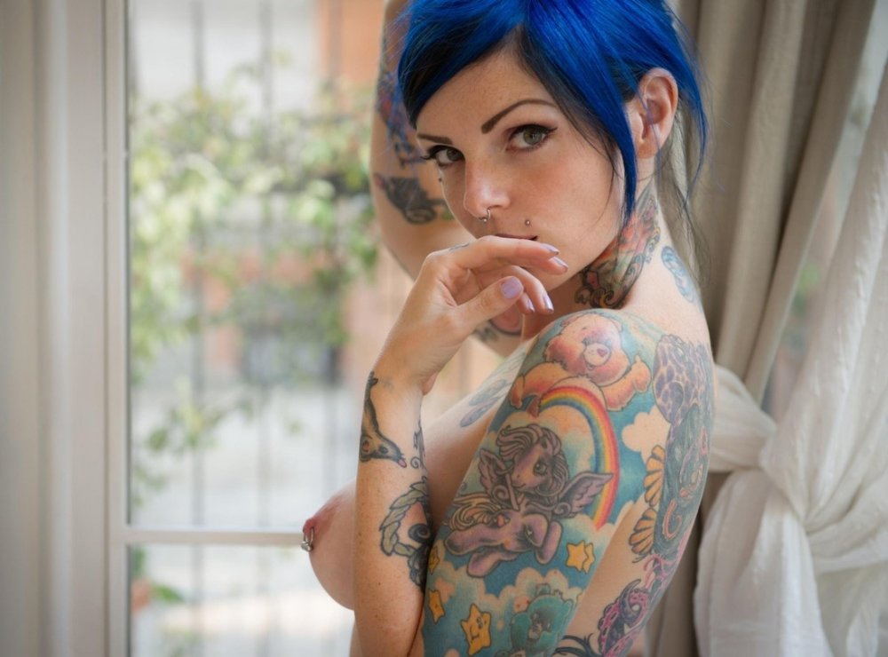 Naked with a square with blue hair