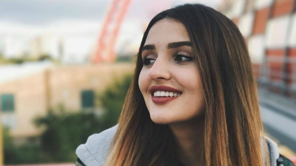 Dina Saeva filled a tattoo