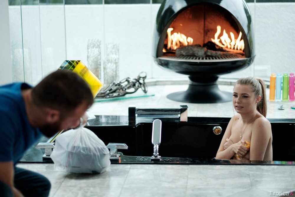 Strawberry with cream in the mouth