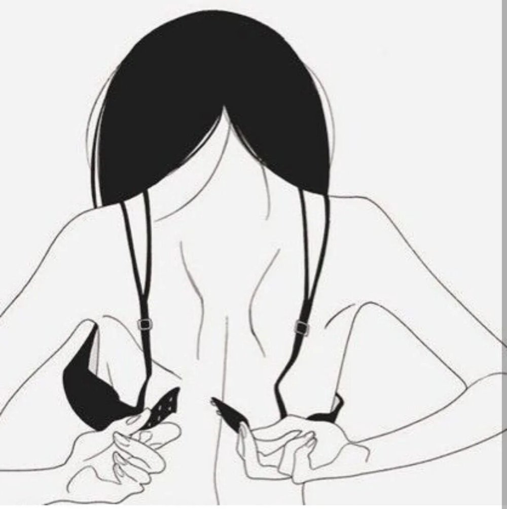 Strawberry on a naked woman